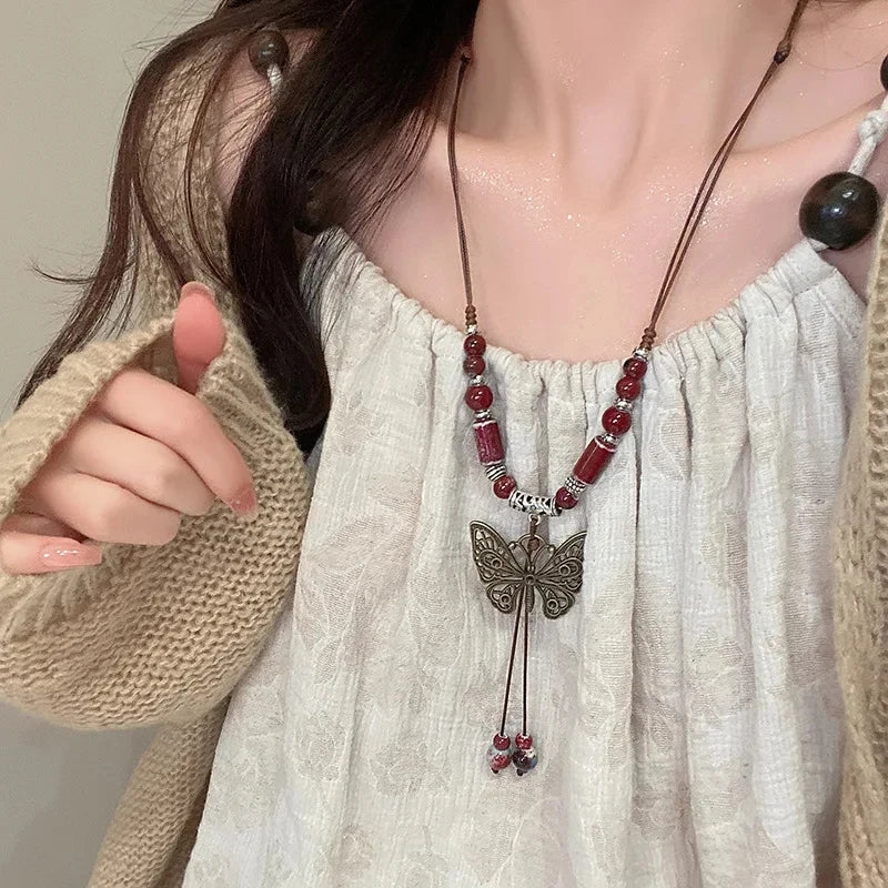 New Chinese style beaded butterfly necklace with a new high-end design niche sweater chain, women's summer collarbone chain