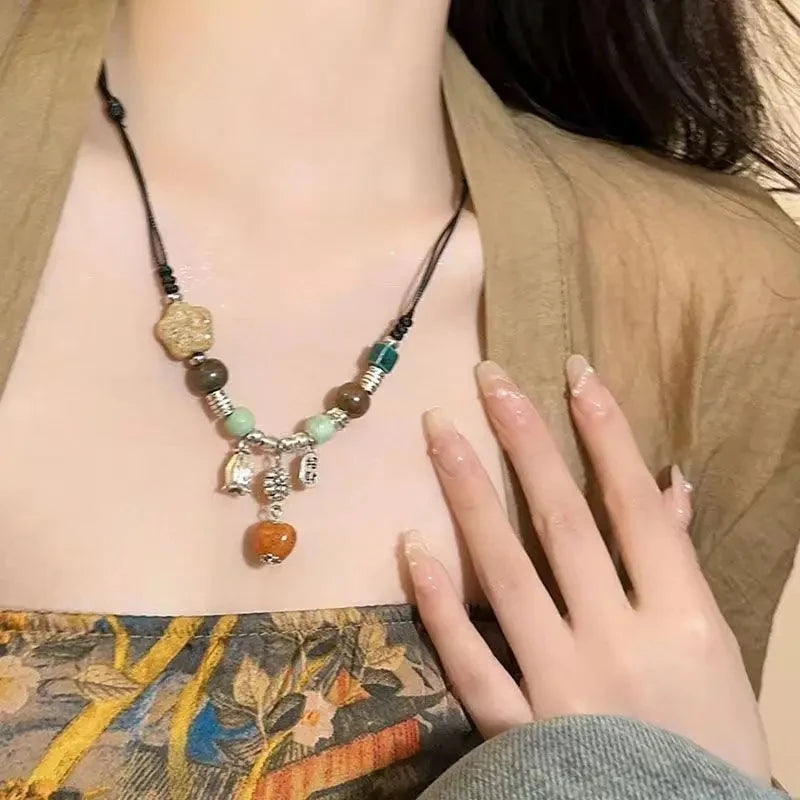 New Chinese style beaded butterfly necklace with a new high-end design niche sweater chain, women's summer collarbone chain